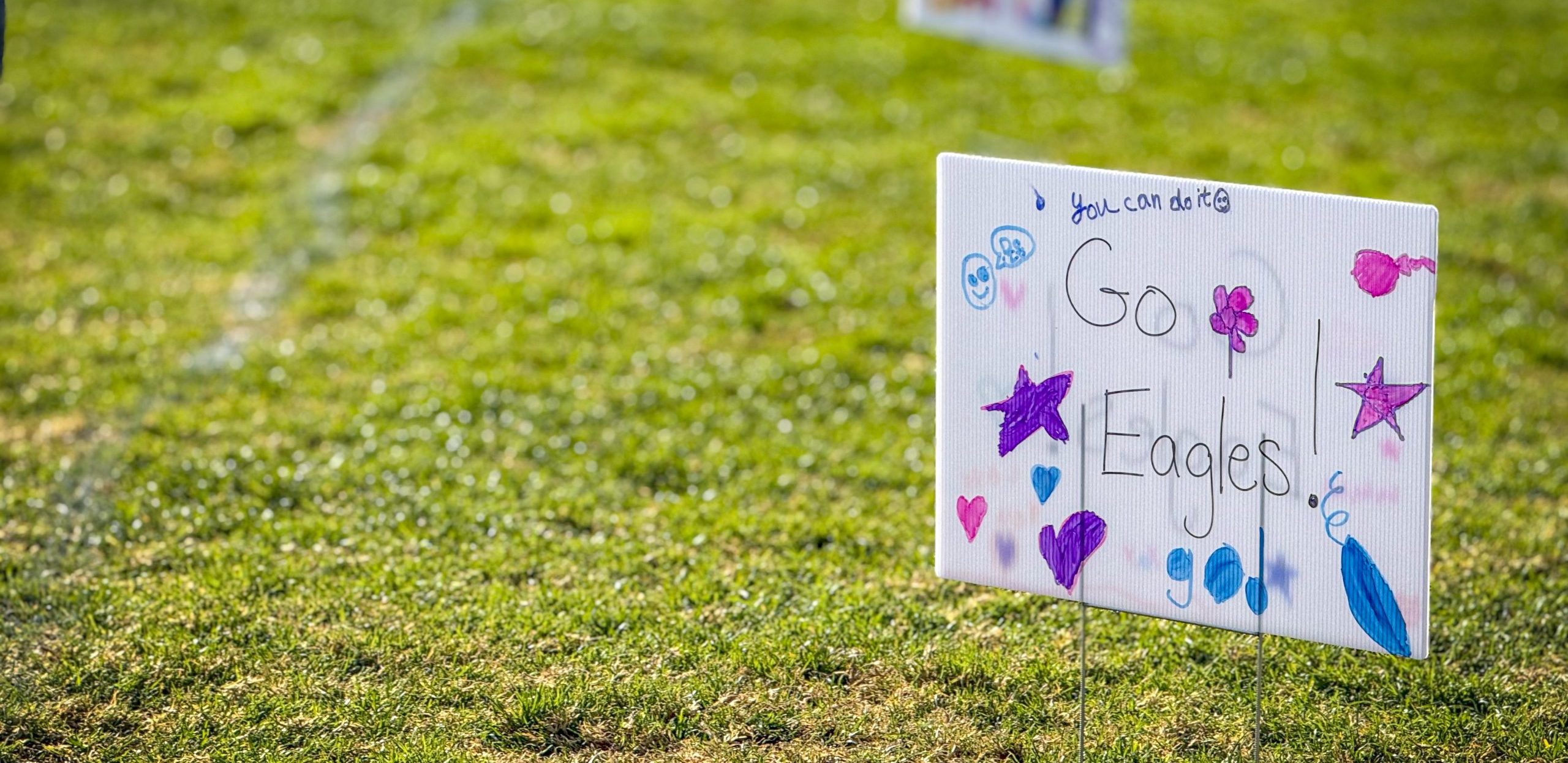 Go Eagles yard sign made by a student
